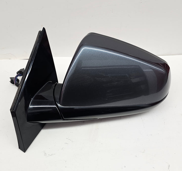 Back view of OEM auto-dimming driver mirror for Cadillac SRX 2010–2016, power fold, gray finish