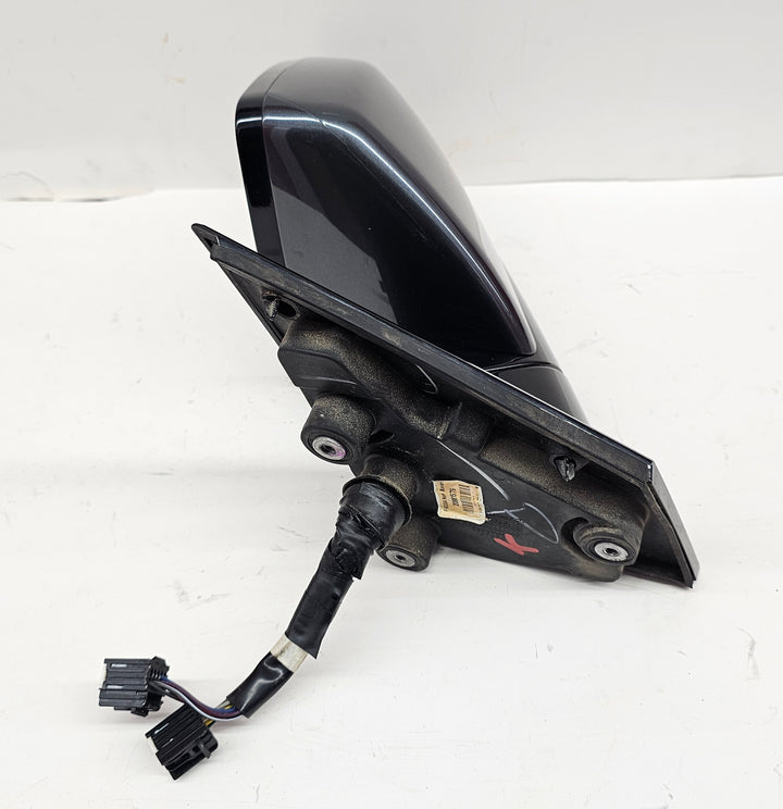 Rear view of Cadillac SRX 2010–2016 left side mirror in flannel gray, OEM power folding version