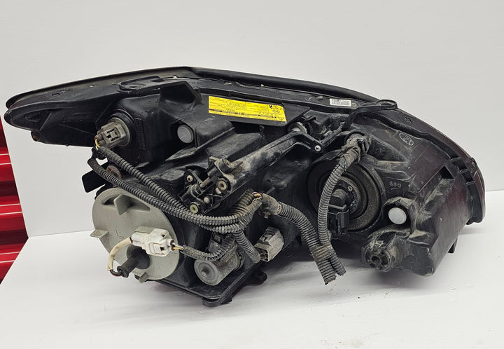 Side view of left driver headlight OEM Lexus RX400H 2006–2008 USA delivery