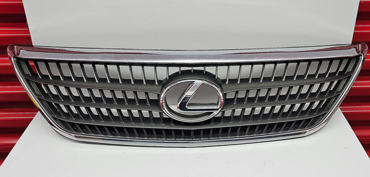 Front view of OEM Lexus RX400h grille emblem for 2006–2009