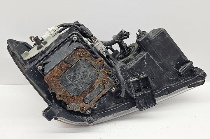 OEM Lexus RX400H driver side headlight 2006–2008 – side angle view